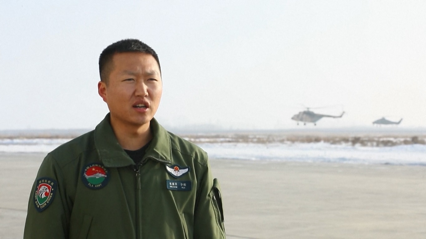 Di sebuah kamp pelatihan di dekat kaki utara Gunung Tianshan di Xinjiang