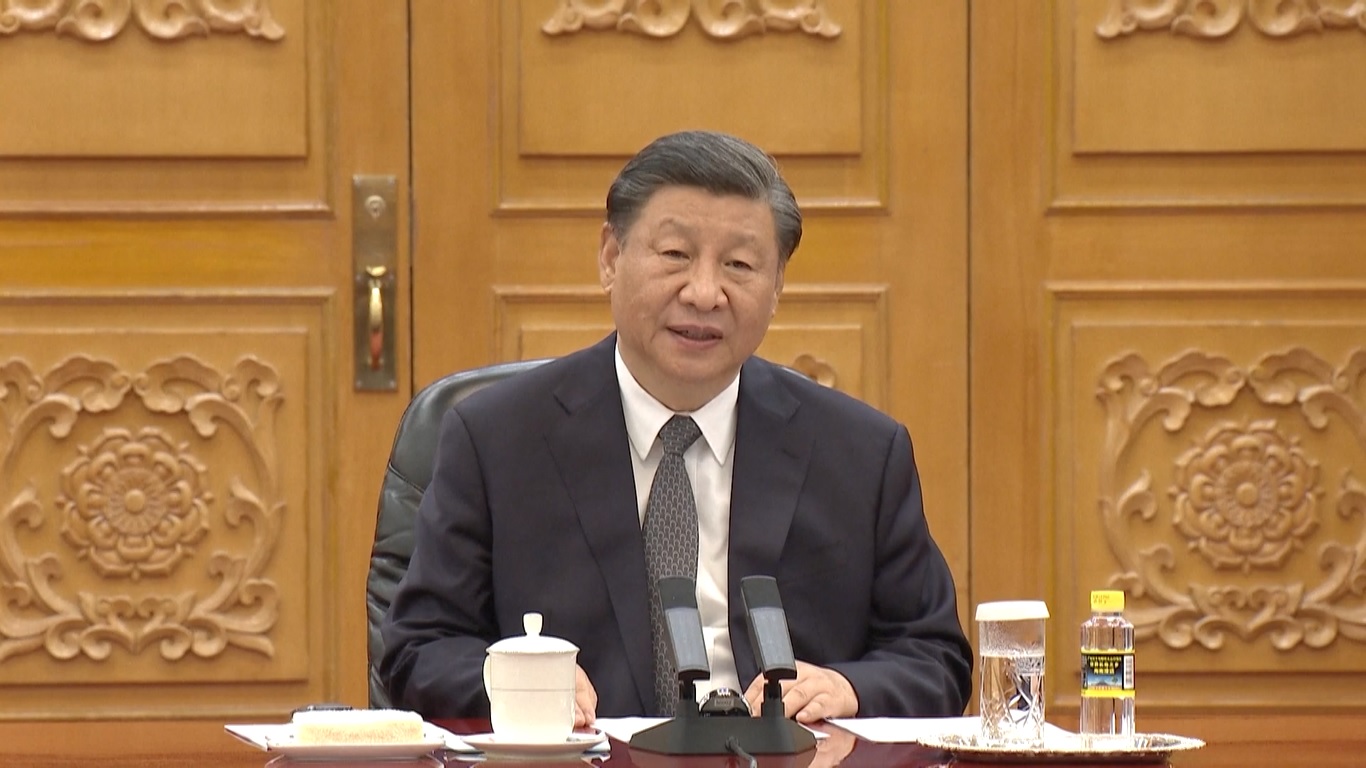Xi