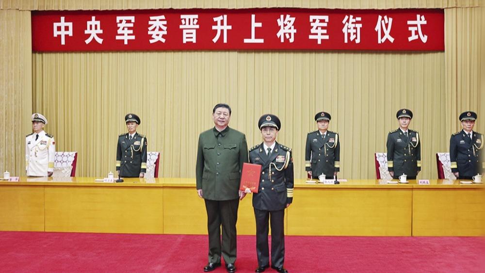 Komisi Militer Pusat Tiongkok mengadakan upacara kenaikan pangkat jenderal di Gedung Bayi Beijing pada hari selasa (9/7) kemarin Ketua Komisi Militer Pusat RRT Xi Jinping menghadiri upacara tersebut