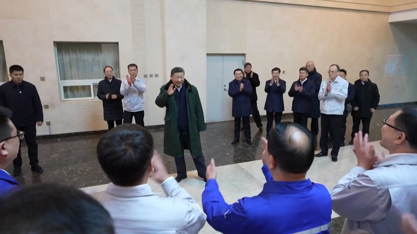 Xi